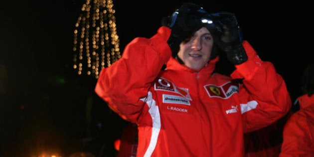 MADONNA DI CAMPIGLIO, ITALY: German Formula 1 driver Michael Schumacher adjusts his goggles after night skiing in the winter resort of Madonna di Campiglio, in the Dolomites area, northern Italy, 12 January 2005. Schumacher takes part in the traditionnal Ferrari winter meeting with the press. AFP PHOTO / Patrick HERTZOG (Photo credit should read PATRICK HERTZOG/AFP/Getty Images)