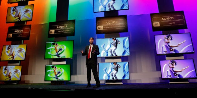 Jim Sanduski, senior vice president for strategic product marketing at Sharp Electronics Marketing Co. of America, speaks about the introduction of new 4K and HD Aquos televisions during a news conference at the 2014 Consumer Electronics Show (CES) in Las Vegas, Nevada, U.S., on Monday, Jan. 6, 2014. The CES trade show, which runs until Jan. 10, is the world's largest annual innovation event, offering an array of entrepreneur-focused exhibits, events, and conference sessions for technology entrepreneurs. Photographer: Patrick T. Fallon/Bloomberg via Getty Images