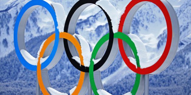 SOCHI, RUSSIA - FEBRUARY 19: Snow collects on the Olympic Rings during day 12 of the 2014 Sochi Winter Olympics at Laura Cross-country Ski & Biathlon Center on February 19, 2014 in Sochi, Russia. (Photo by Richard Heathcote/Getty Images)