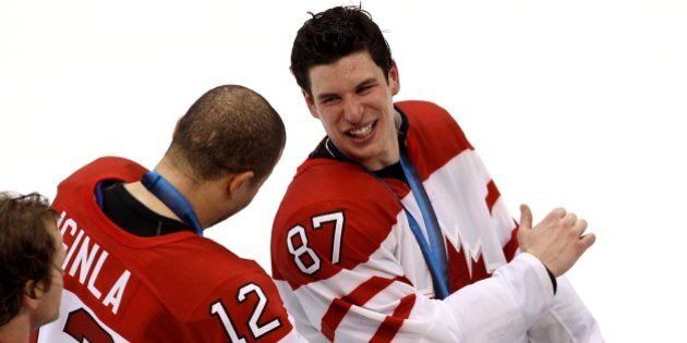 VANCOUVER, BC - FEBRUARY 28: Sidney Crosby #87 of Canada smiles along with Jarome Iginla #12 after the ice hockey men's gold medal game between USA and Canada on day 17 of the Vancouver 2010 Winter Olympics at Canada Hockey Place on February 28, 2010 in Vancouver, Canada. Canada defeated USA 3-2 in overtime. (Photo by Alex Livesey/Getty Images)