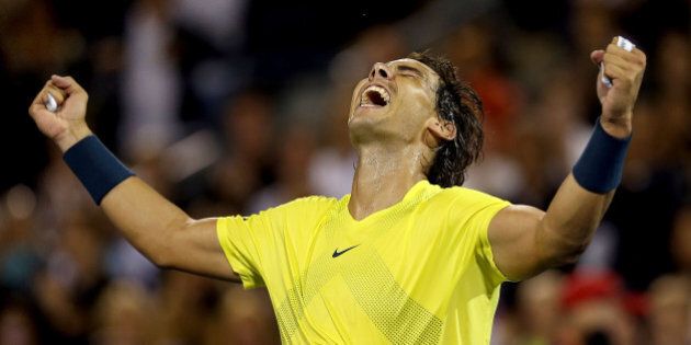 MONTREAL, QC - AUGUST 10: Rafael Nadal of Spain celebrates his win over Novak Djokovic of Serbia during the semifinals of the Rogers Cup at Uniprix Stadium on August 10, 2013 in Montreal, Quebec, Canada. (Photo by Matthew Stockman/Getty Images)
