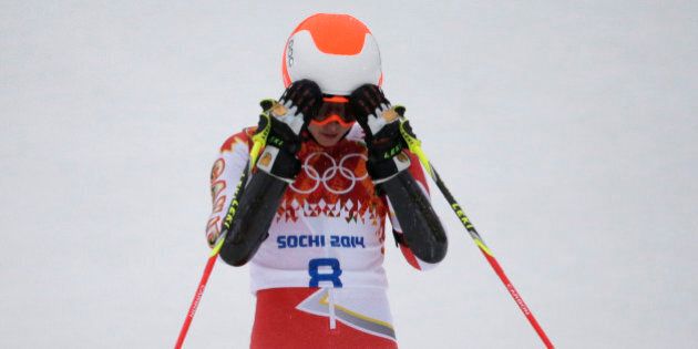 Canada's Marie-Michele Gagnon catches her breath after completing the first run in the women's giant slalom at the Sochi 2014 Winter Olympics, Tuesday, Feb. 18, 2014, in Krasnaya Polyana, Russia. (AP Photo/Gero Breloer)