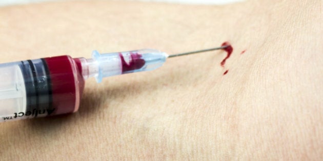 injection in arm injecting...