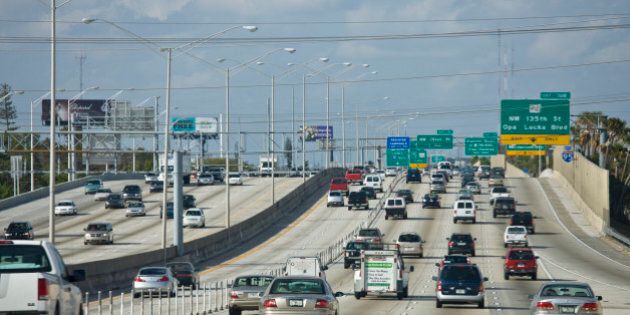 UNITED STATES - DECEMBER 14: Traffic on the highway heading out of Miami at Opa Locka Boulevard, Florida, United States of America (Photo by Tim Graham/Getty Images)