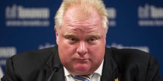 TORONTO, ON - JULY 15: Toronto Mayor Rob Ford speaks with reporters after meeting with transportation minister Glen Murray at City Hall on July 15, 2013. (Carlos Osorio/Toronto Star via Getty Images)