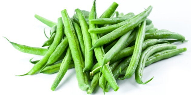 green beans isolated on a white ...