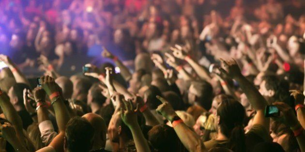 crowd at a music concert ...
