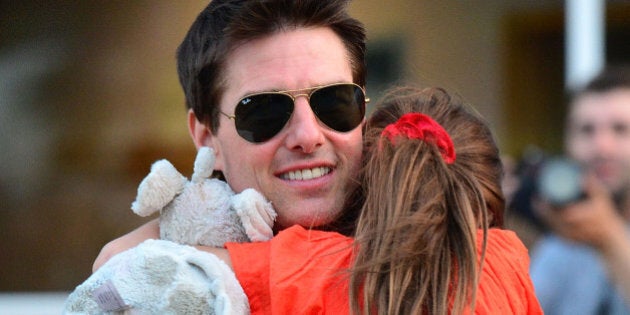 NEW YORK, NY - JULY 17: Tom Cruise and Suri Cruise leave Chelsea Piers on July 17, 2012 in New York City. (Photo by James Devaney/WireImage)