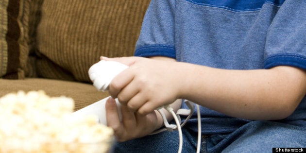 young boy having fun playing...