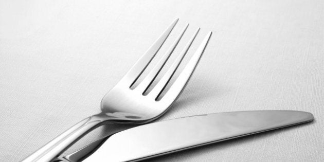 fork and knife on a napkin on...