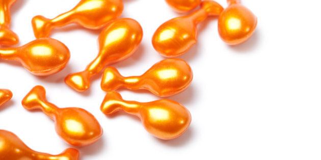orange cosmetic capsules...