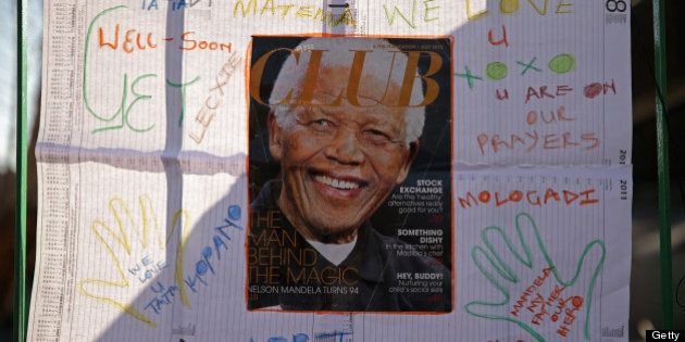 PRETORIA, SOUTH AFRICA - JUNE 25: One of the dozens of hand-made messages of support for former South African President Nelson Mandela is posted to the wall outside the Mediclinic Heart Hospital June 25, 2013 in Pretoria, South Africa. South African President Jacob Zuma confirmed on June 23 that Mandela's condition has become critical since he was admitted to the hospital over two weeks ago for a recurring lung infection. (Photo by Chip Somodevilla/Getty Images)