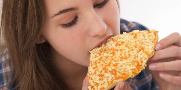 Food Pizza Teenage Girl. (Photo by: Media for Medical/UIG via Getty Images)