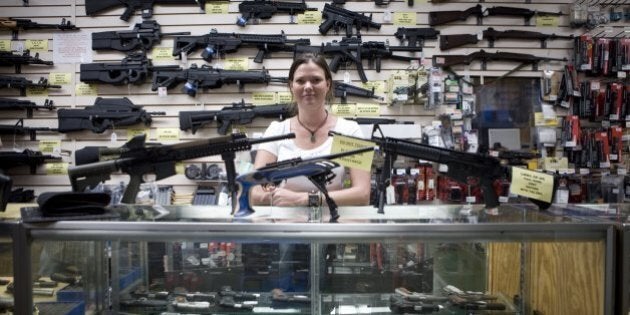 SAN ANTONIO, TEXAS - JUNE 17: Gina Brewer, the manager Texas Gun, one of the 6,700 gun dealers located near the 2,000 miles long U.S.-Mexico border, insists that she has not sold weapons to Mexican drug cartels representatives, in San Antonio, June 17 2009. Automatic weapons such as AK-47 and AR-15 are purchased in U.S. border states by straw men (paid about $100 per weapons) working for Mexican drug cartels and smuggled into Mexico, where they fuel the narco-violence that has caused over 15,000 death since 2006. In Mexico, where gun sales are illegal, there is only one gun store, solely for police and army supplies. The ATF estimates that 90% of the 23,000 weapons seized in Mexico since 2005 come from the U.S. Following the admission by Secretary of State Hillary Clinton that the U.S. has a responsability in the narco-violence in Mexico (and fearing that it will spill into the U.S.), the ATF, Border Patrol, Homeland Security, ICE, and local police and sheriff are now trying to stem the flow of weapons into Mexico. But surprise check points inspecting vehicules heading South, in spite of hi-tech device like gas tank cameras, are easy to spot for narco-spies, and do little to slow the flow of arms into Mexico. On the Mexican side, Customs are well equiped with machines that can scan entires trucks, but they remain vulnerable to endemic corruption. (Photo by Gilles Mingasson/Getty Images)