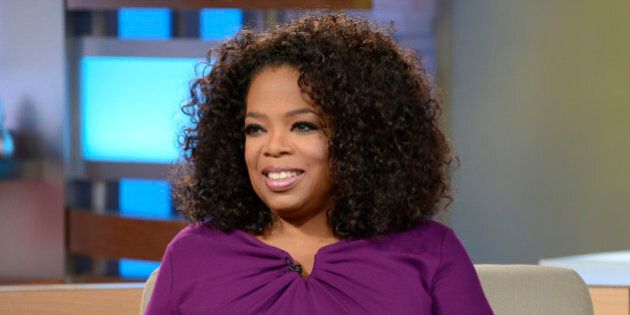 GOOD MORNING AMERICA - Oprah Winfrey visits GOOD MORNING AMERICA, 8/6/13, airing on the ABC Television Network. (Photo by Ida Mae Astute/ABC via Getty Images) OPRAH WINFREY