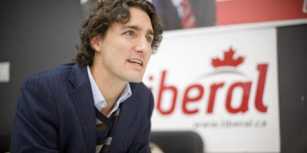 TO GO WITH AFP STORY BY GUILLAUME LAVALLEE 'CANADA-VOTE-HISTORY-PEOPLE-TRUDEAU' Justin Trudeau, son of former Canadian Prime Minister Pierre Trudeau and candidate for the Liberal Party in Montreal, is seen during an interview in his campaign office on October 12, 2008 in Montreal, two days before the federal elections on October 14. One of three sons of Pierre Elliott Trudeau, prime minister of Canada from 1968 to 1979, and 1980 to 1984, Justin Trudeau swapped a teaching career for a chance to represent his father's Liberals in the Montreal electoral district of Papineau, and win it back from the separatists who took it in 2006. AFP PHOTO/David BOILY (Photo credit should read DAVID BOILY/AFP/Getty Images)