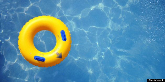 yellow pool float pool ring in ...