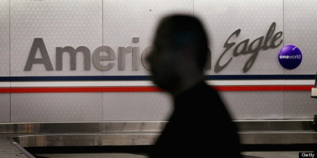 CHICAGO, IL - NOVEMBER 14: A passenger walks through the baggage area that services passengers of American Eagle Airlines at O'Hare Airport on November 14, 2011 in Chicago, Illinois. The U.S. government fined American Eagle $900,000 for repeated tarmac delays that stranded passengers on planes for more than three hours. This is the first time an airline has been fined since the rule limiting the time a commercial airline could keep passengers sitting on the tarmac was imposed last year. (Photo by Scott Olson/Getty Images)