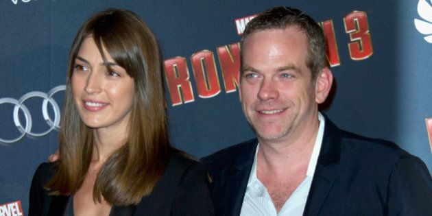 PARIS, FRANCE - APRIL 14: Stephanie Fournier (L) and Garou (R) pose during the 'Iron Man 3' photocall at Le Grand Rex on April 14, 2013 in Paris, France. (Photo by Pascal Le Segretain/WireImage)