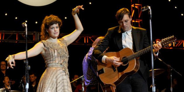 MOUNTAIN VIEW, CA - OCTOBER 22: Régine Chassagne (L) and Win Butler of Arcade Fire perform as part of the 25th Annual Bridge School Benefit at Shoreline Amphitheatre on October 22, 2011 in Mountain View, California. (Photo by Tim Mosenfelder/Getty Images)