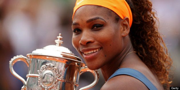 PARIS, FRANCE - JUNE 08: Serena Williams of United States of America poses with the Coupe Suzanne Lenglen after victory in the Women's Singles Final match against Maria Sharapova of Russia during day fourteen of French Open at Roland Garros on June 8, 2013 in Paris, France. (Photo by Clive Brunskill/Getty Images)