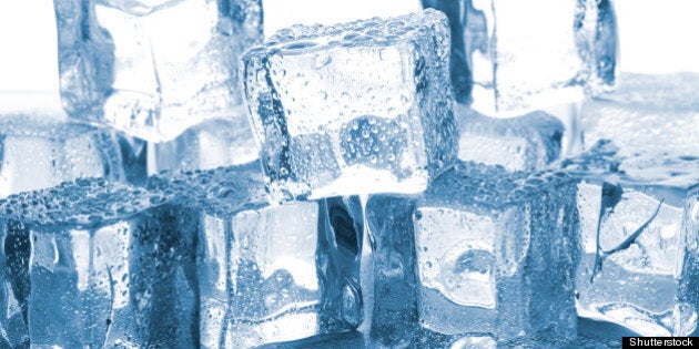 melting ice cubes on glass table