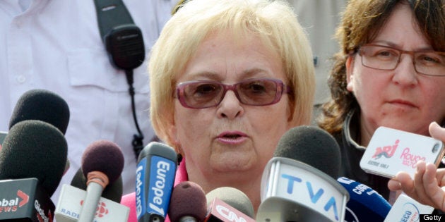 Mayor Colette Roy-Laroche holds a press conference July 9, 2013 in Lac-megantic, Quebec, Canada, to announce that displaced residents would be able to return to their homes following the derailment and explosion of a freight train operated by Montreal, Maine & Atlantic Railway early Saturday, that unleashed a wall of fire that tore through homes and businesses in Lac-Megantic -- population 6,000. PHOTO STEEVE DUGUAY-AFP (Photo credit should read STEEVE DUGUAY/AFP/Getty Images)