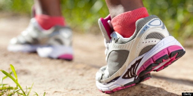 Closeup female foot. Woman running at a slow and leisurely pace.