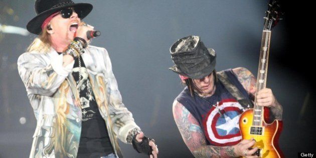 BRASILIA, BRAZIL - MARCH 07: Axl Rose (L) and DJ Ashba, of the US band Gun's Roses, perform their concert part of the Chinese Democracy Tour at the Mane Garrincha Stadium on March 7, 2010 in Brasilia, Brazil. (Photo by Adriano Machado/LatinContent/Getty Images)