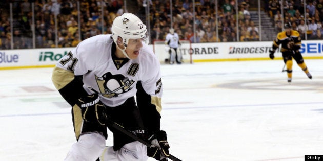 BOSTON, MA - JUNE 05: Evgeni Malkin #71 of the Pittsburgh Penguins skates with the puck against the Boston Bruins during Game Three of the Eastern Conference Final of the 2013 NHL Stanley Cup Playoffs at the TD Garden on June 5, 2013 in Boston, Massachusetts. (Photo by Bruce Bennett/Getty Images)