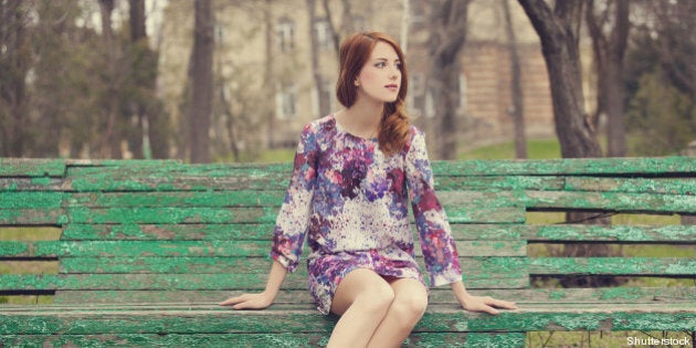 style redhead girl sitting on...