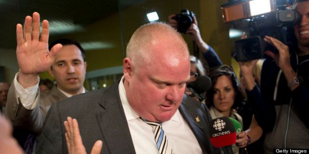 TORONTO, ON - MAY 27: Rob Ford walked through a throng of media Monday afternoon after his press secretaries quit. (Lucas Oleniuk/Toronto Star via Getty Images)