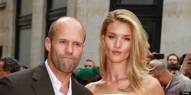 LONDON, UNITED KINGDOM - JUNE 17: Jason Statham and Rosie Huntington-Whiteley attend the UK Premiere of 'Hummingbird' at Odeon West End on June 17, 2013 in London, England. (Photo by Fred Duval/Getty Images)