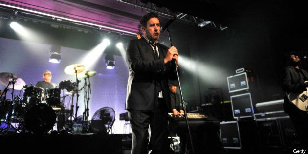 SHEFFIELD, UNITED KINGDOM - MAY 16: Terry Hall of The Specials perform on stage at O2 Academy on May 16, 2013 in Sheffield, England. (Photo by Neil H Kitson/Redferns via Getty Images)