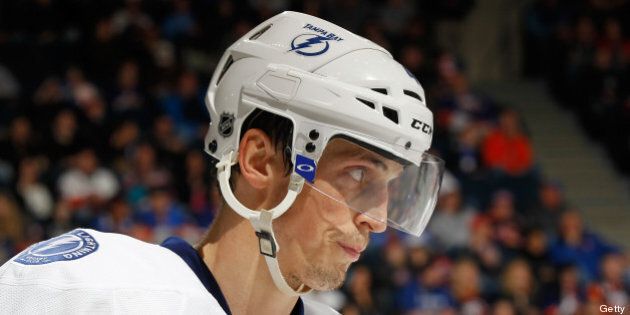 UNIONDALE, NY - APRIL 06: Vincent Lecavalier #4 of the Tampa Bay Lightning skates against the New York Islanders at Nassau Veterans Memorial Coliseum on April 6, 2013 in Uniondale, New York. The Islanders defeated the Lightning 4-2. (Photo by Mike Stobe/NHLI via Getty Images)
