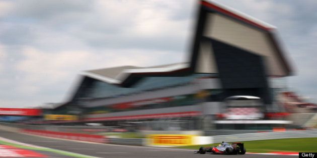 NORTHAMPTON, ENGLAND - JULY 08: Lewis Hamilton of Great Britain and McLaren drives during the British Grand Prix at Silverstone Circuit on July 8, 2012 in Northampton, England. (Photo by Clive Mason/Getty Images)