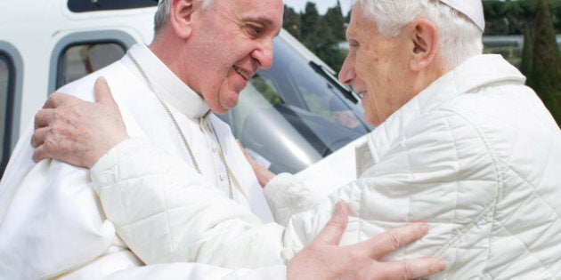 ROME, ITALY - MARCH 23: (EDITORIAL USE ONLY AND STRICTLY NO COMMERCIAL OR MERCHANDISING USAGE - BOOKS OUT, BROADCAST OUT, All image rights and copyrights reserved to the photographic Service of L'Osservatore Romano. IMAGE IS NOT LICENSED FOR USAGE BEYOND 60 DAYS OF CREATE DATE) Recently elected Pope Francis (L) and his predecessor, Pope Emeritus Benedict XVI, meet at the helicopter pad of the papal summer residence, Castel Gandolfo on March 23, 2013 near Rome, Italy. Pope Francis and Pope Emeritus Benedic met to have a private lunch. Historically there is no known records of a pope and former pope meeting as a new pontiff is only elected on the death his predecessor. (Photo by Servizio Fotografico L'Osservatore Romano via Getty Images)