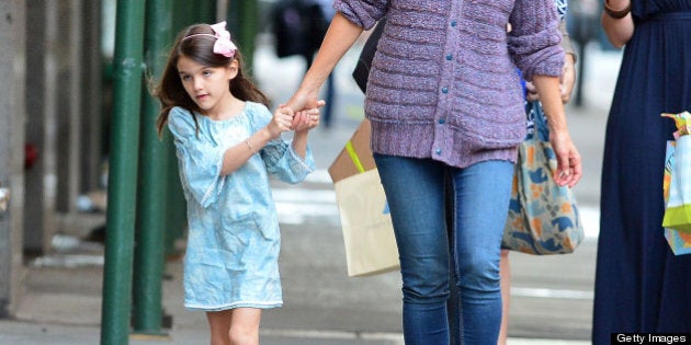 NEW YORK, NY - SEPTEMBER 16: Katie Holmes and Suri Cruise (L) seen on the streets of Manhattan on September 16, 2012 in New York City. (Photo by James Devaney/FilmMagic)