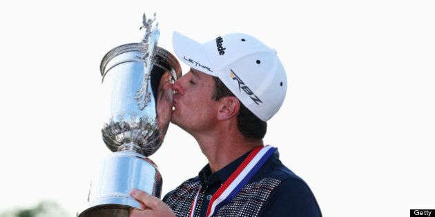 ARDMORE, PA - JUNE 16: Justin Rose of England kisses the U.S. Open trophy after winning the 113th U.S. Open at Merion Golf Club on June 16, 2013 in Ardmore, Pennsylvania. (Photo by Andrew Redington/Getty Images)