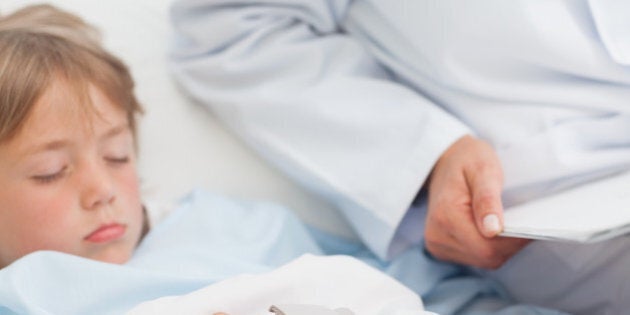 child sleeping on a medical bed ...