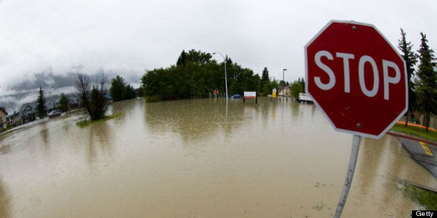 CANMORE, CANADA - JUNE 21: The front entrance to the Canmore General Hospital is overcome with water due to heavy flooding June 21, 2013 in Canmore, Alberta, Canada. Widespread flooding caused by torrential rains washed out bridges and roads prompting the evacuation of thousnds. (Photo by John Gibson/Getty Images)