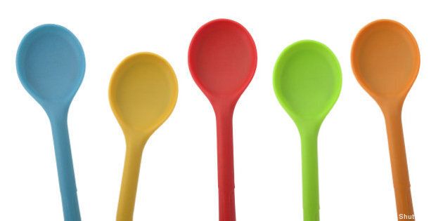 five colorful ladles isolated...