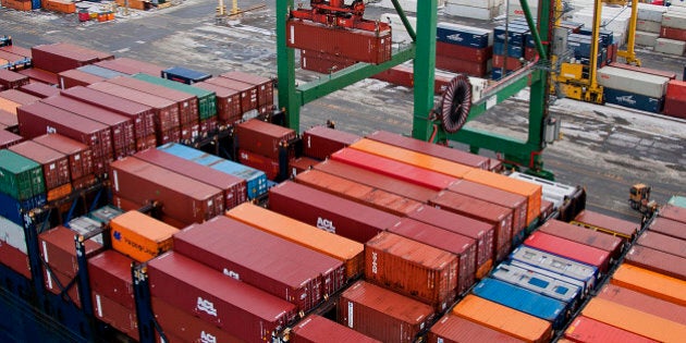 Freight containers sit stacked on an Atlantic Container Line (ACL) ship docked at the Port Of Halifax's Fairview Cove container terminal, operated by Cerescorp Co., in Halifax, Nova Scotia, Canada, on Wednesday, Jan. 30, 2013. Statistics Canada (STCA) is scheduled to release gross domestic product data on Jan. 31. Photographer: Aaron McKenzie Fraser/Bloomberg via Getty Images