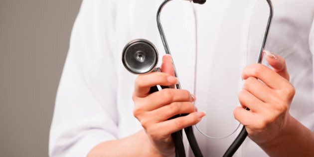 Stethoscope in doctor hands