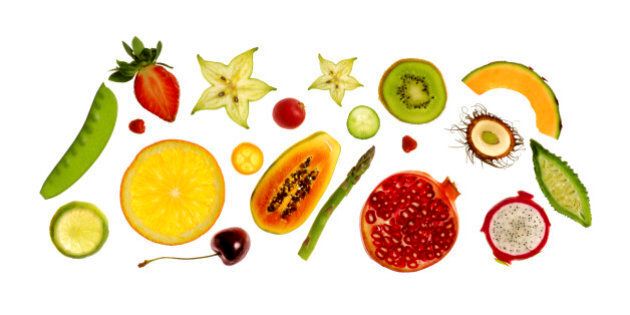 Fresh fruit and vegetables on white background.