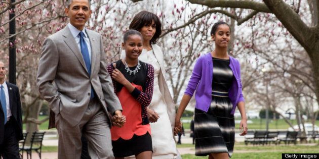 WASHINGTON, D.C. - MARCH 31: President Barack Obama, daughter Sasha, first lady Michelle Obama and daughter Malia walk across Lafayette Park from the White House on their way to Easter services at St John's Episcopal Church March 31, 2013 in Washington, D.C. (Photo by Drew Angerer-Pool/Getty Images)
