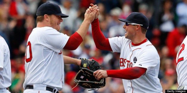 BOSTON, MA - APRIL 20: Andrew Bailey #40 of the Boston Red Sox celebrates with Daniel Nava #29 after defeating the Kansas City Royals, 4-3, at Fenway Park on April 20, 2013 in Boston, Massachusetts. (Photo by Jim Rogash/Getty Images)