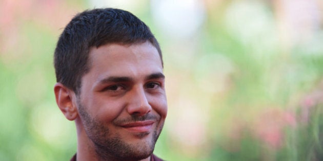 Canadian director Xavier Dolan arrives for the screening of 'Tom a la Ferme' presented in competition at the 70th Venice Film Festival on September 2nd, 2013 at Venice Lido. AFP PHOTO / GABRIEL BOUYS (Photo credit should read GABRIEL BOUYS/AFP/Getty Images)