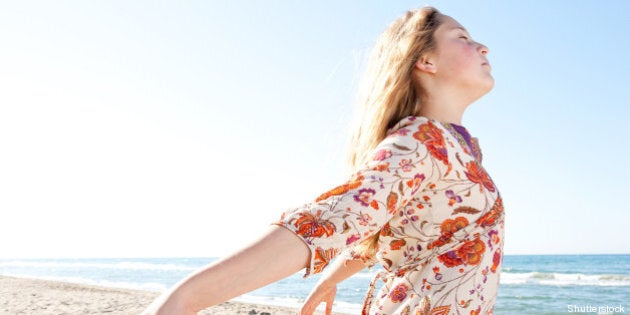 young girl breathing fresh air...