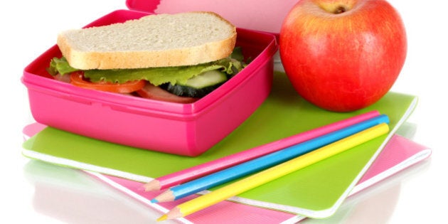 lunch box with sandwich apple...